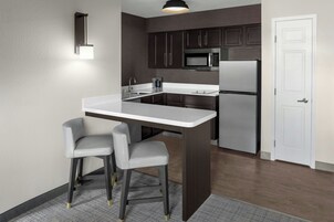 Premium bedding, down comforters, desk, iron/ironing board