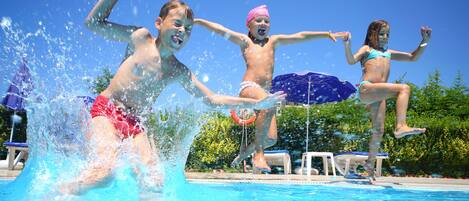 Outdoor pool, open 10:00 AM to 10:00 PM, sun loungers