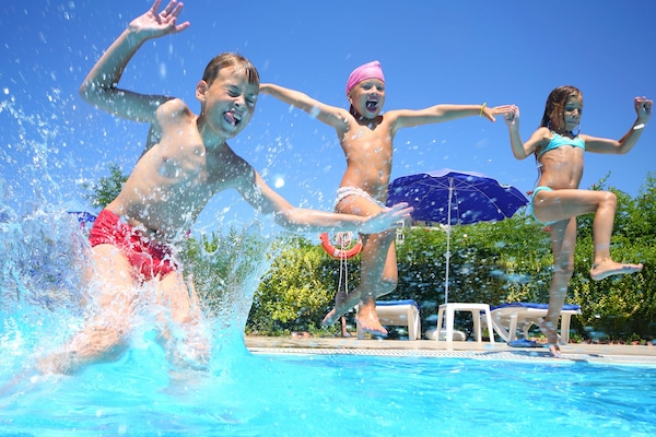 Outdoor pool, open 10:00 AM to 10:00 PM, pool loungers