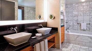 Combined shower/tub, deep soaking tub, designer toiletries, hair dryer