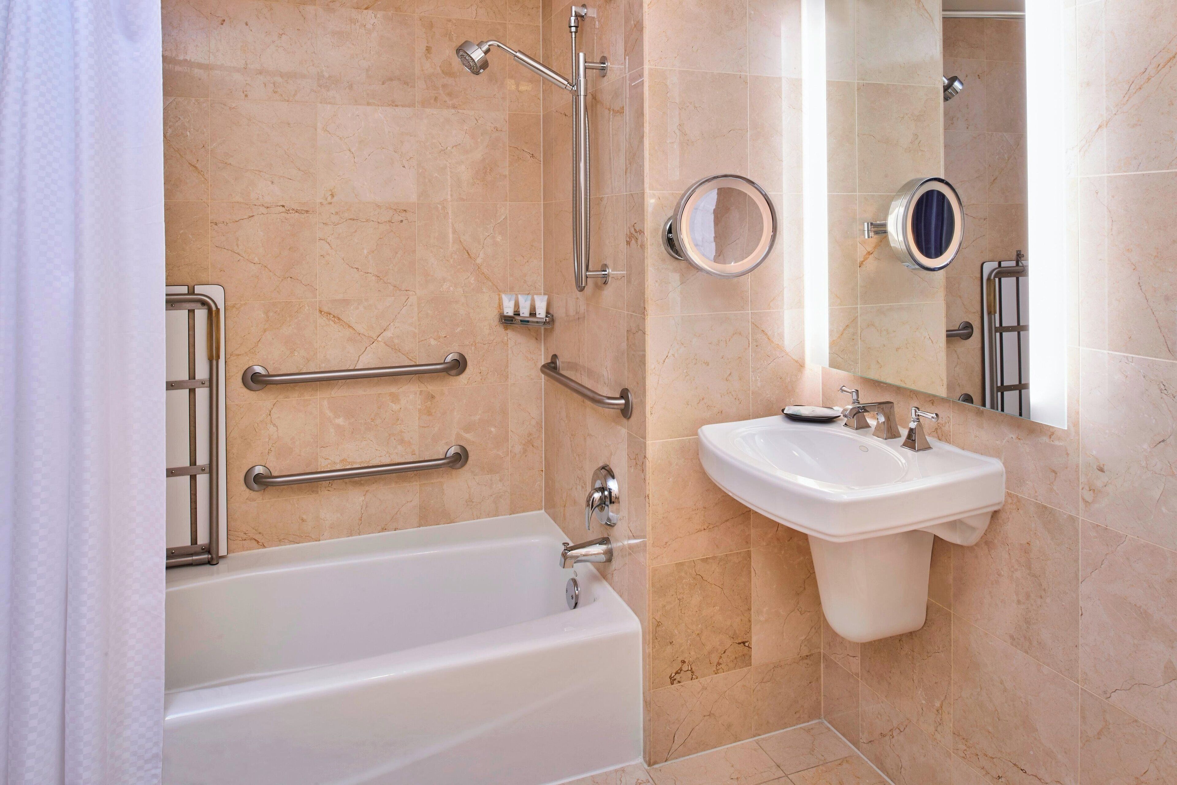 combined shower/bathtub, deep-soaking bathtub, designer toiletries