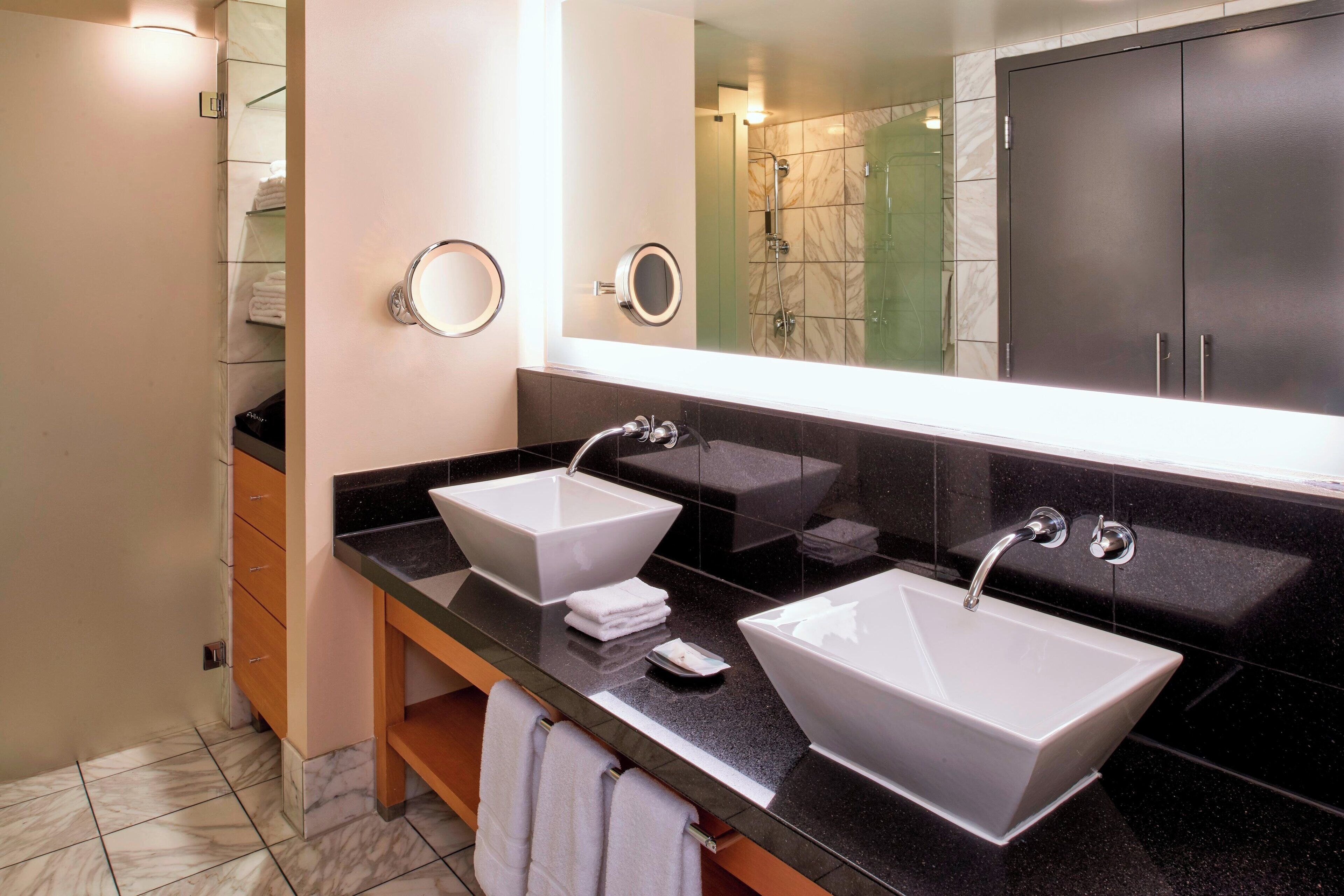 combined shower/bathtub, deep-soaking bathtub, designer toiletries