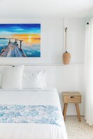 Ropa de cama de alta calidad y minibar 