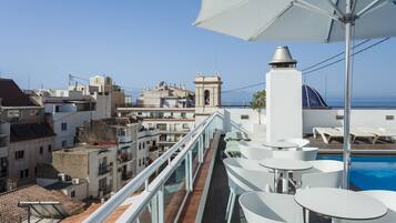 Outdoor pool, open 10 AM to 8:00 PM, sun loungers