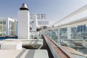 Outdoor pool, open 10 AM to 8:00 PM, sun loungers