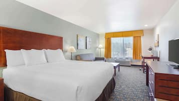 Standard Room, 1 King Bed, Non Smoking (with Sofabed) | Desk, laptop workspace, iron/ironing board, free rollaway beds