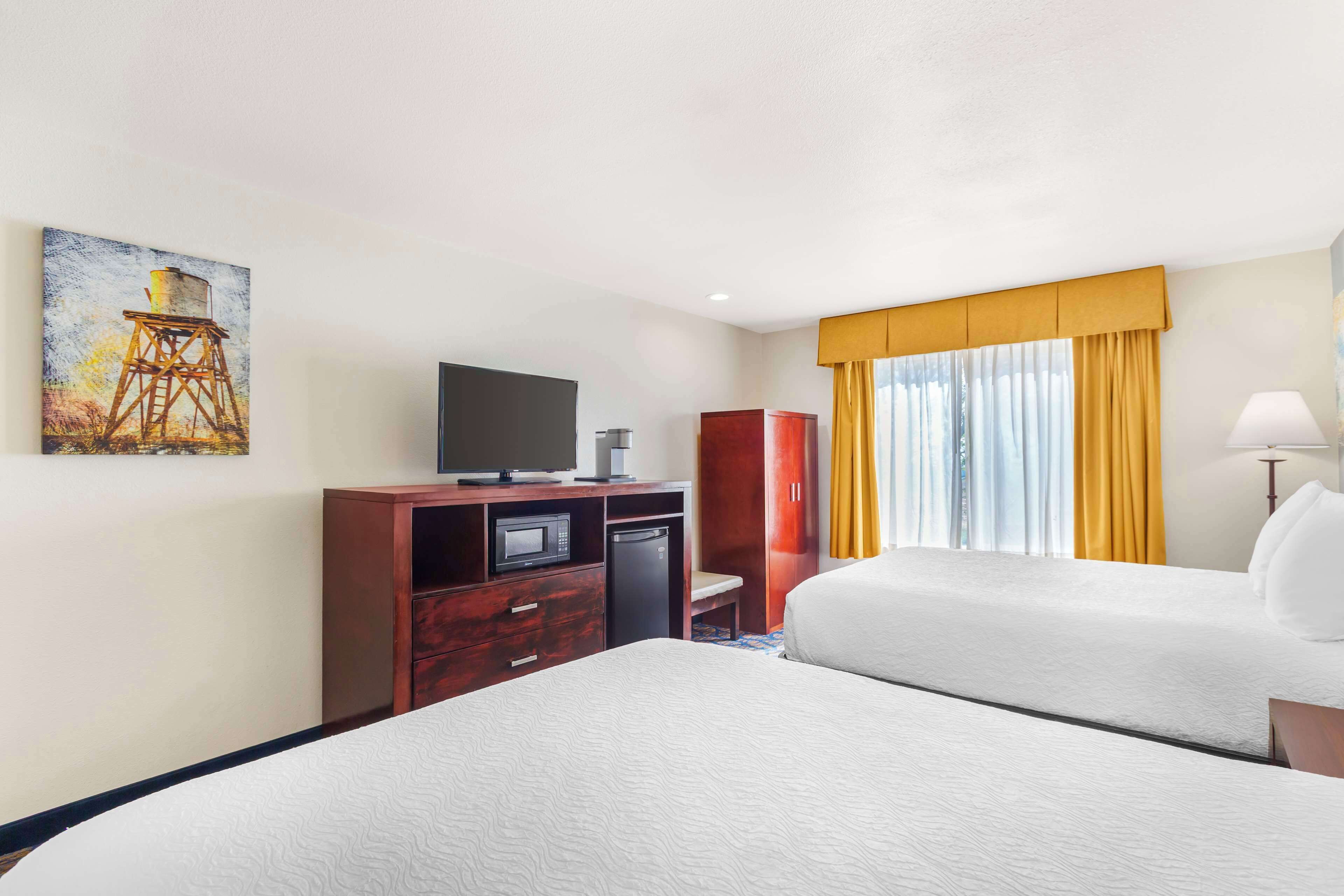 standard room, 2 queen beds, accessible, refrigerator & microwave | desk, laptop workspace, iron/ironing board, free rollaway beds