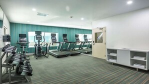 A fitness center with treadmills, elliptical machines, and weight machines. - Holiday Inn Express & Suites Regina-South by IHG (Regina)