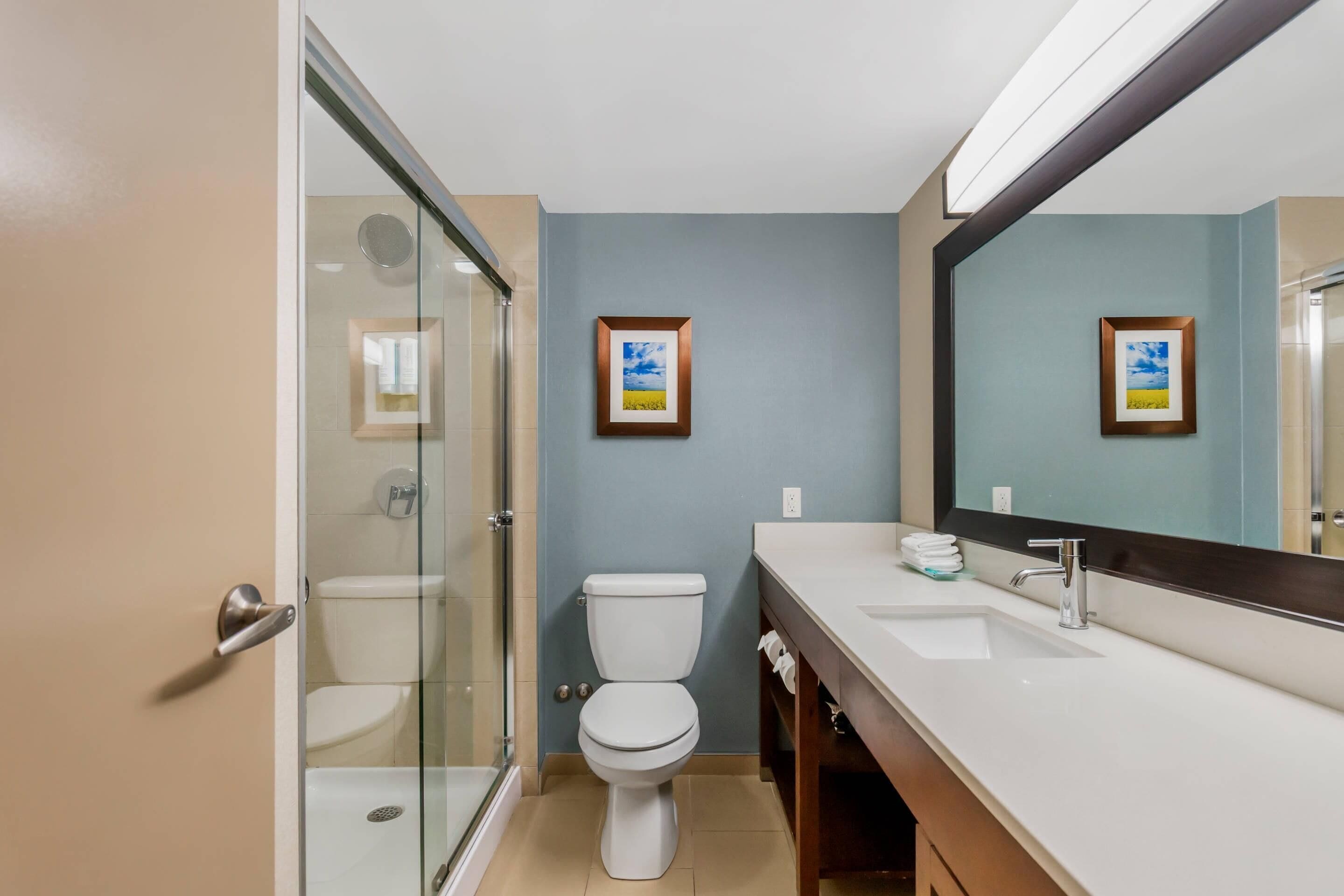 Pillowtop beds, desk, blackout drapes, iron/ironing board