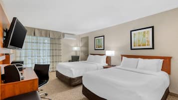 Pillowtop beds, desk, blackout drapes, iron/ironing board