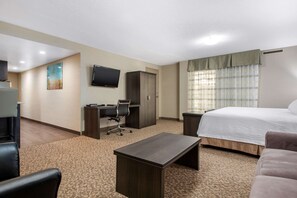 Suite, 1 King Bed, Non Smoking | Pillow-top beds, desk, blackout curtains, iron/ironing board