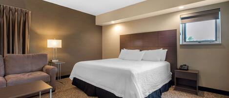 Pillowtop beds, desk, blackout drapes, iron/ironing board