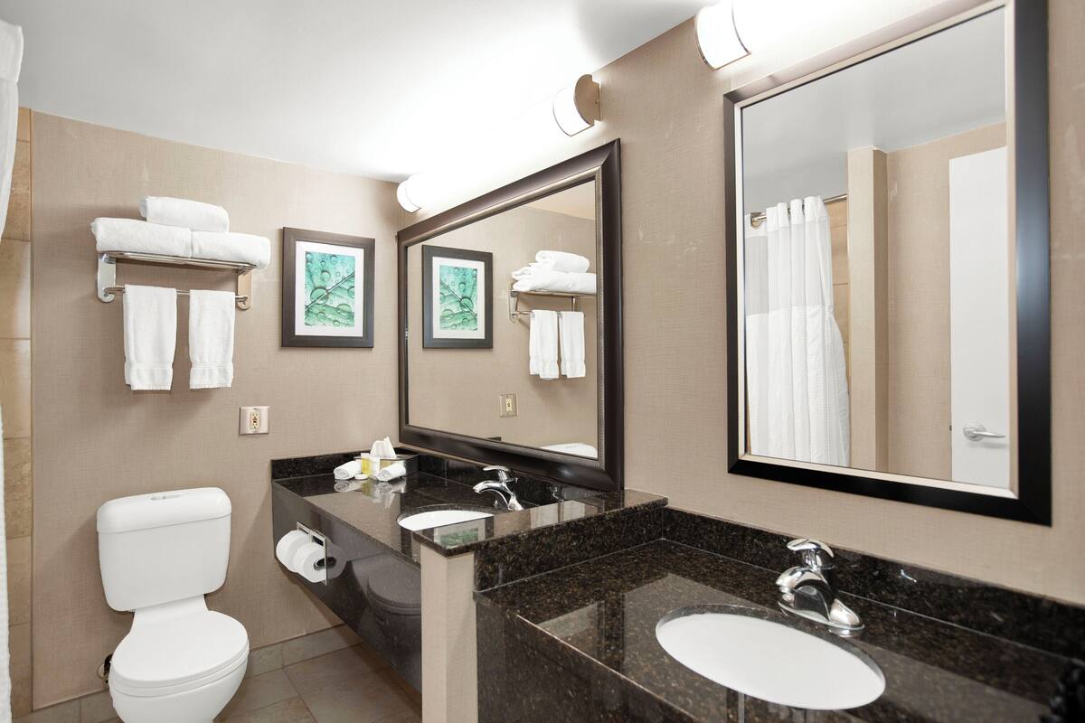 superior room, 2 queen beds, poolside | bathroom | shower, hair dryer, towels, soap