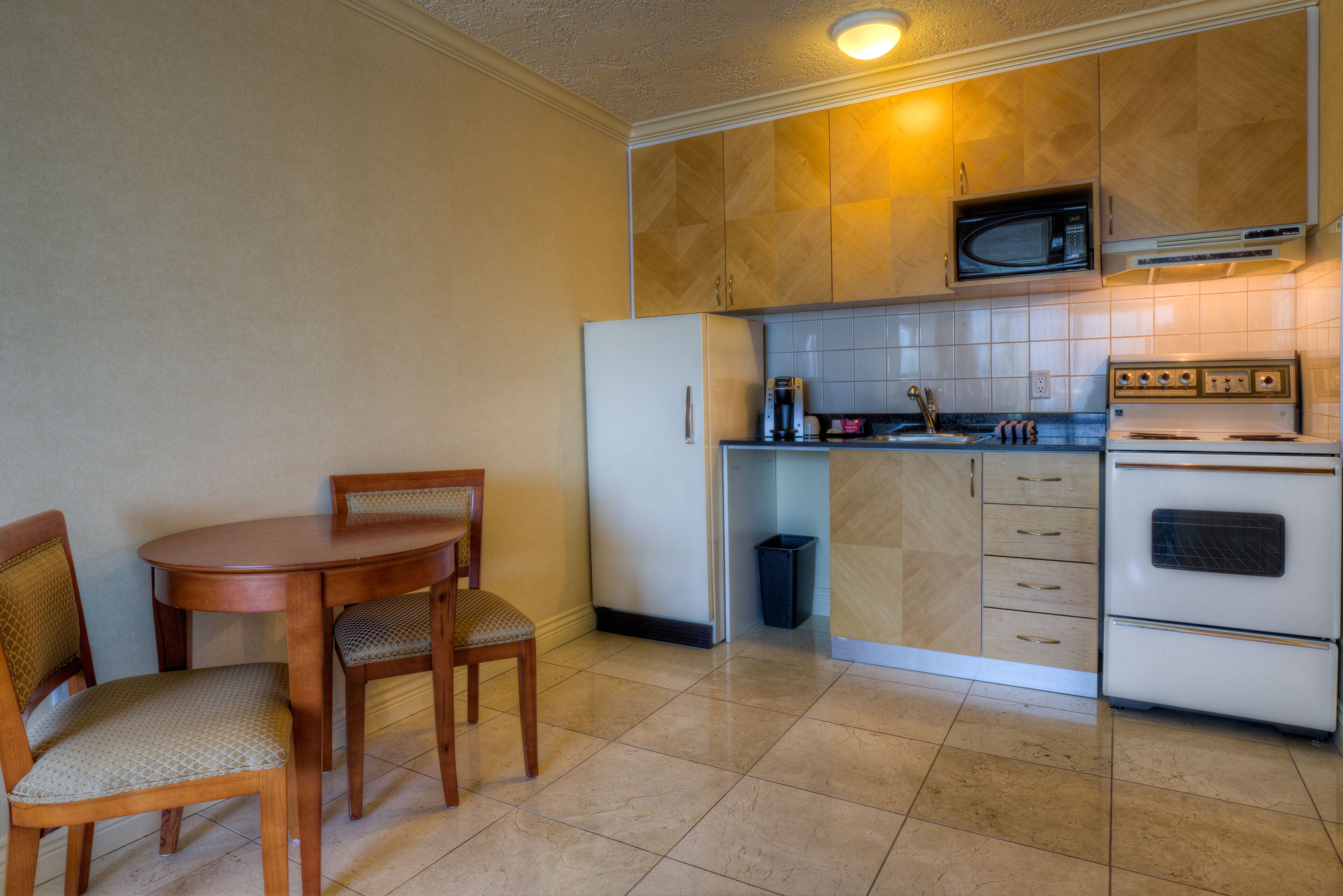 standard suite, 1 bedroom, ocean view | private kitchen | microwave, stovetop, coffee/tea maker, toaster