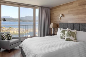 Suite ejecutiva, vistas al mar | 1 dormitorio, ropa de cama hipoalergénica, edredones de plumas