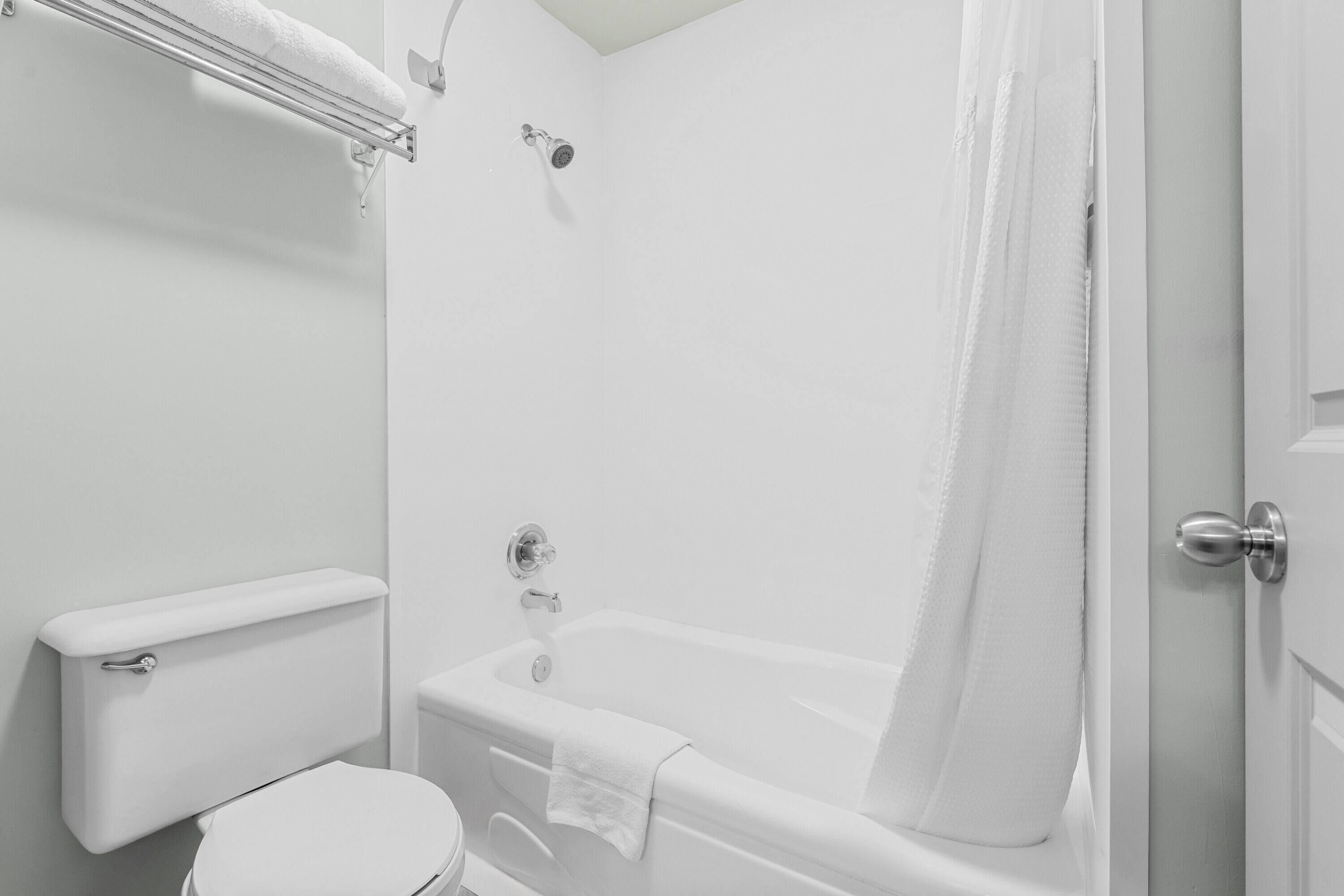 business room, 1 queen bed | bathroom | free toiletries, hair dryer, towels, soap