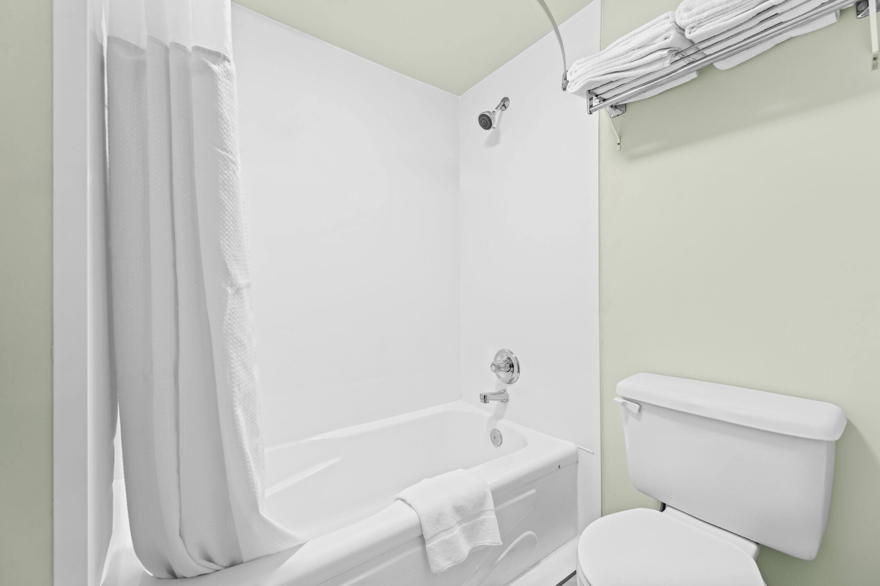 suite, multiple beds, non smoking | bathroom | free toiletries, hair dryer, towels, soap