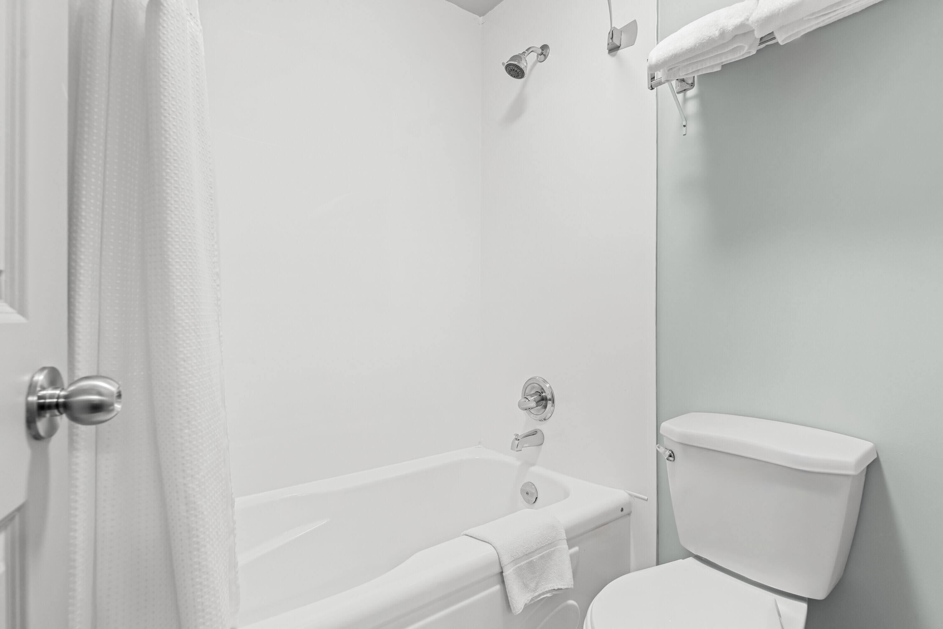 standard room, 2 queen beds | bathroom | free toiletries, hair dryer, towels, soap