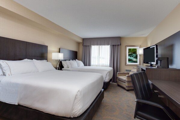 A hotel room with two beds, a desk, a chair, a TV, and a window with curtains. - Holiday Inn Express & Suites Fredericton by IHG (Fredericton)