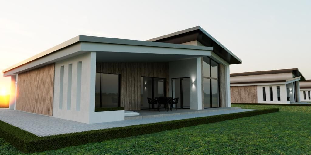 Una casa moderna con un porche cubierto, ventanas amplias y un césped cuidado.