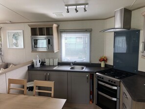 Casa rodante, baño privado | Cocina privada