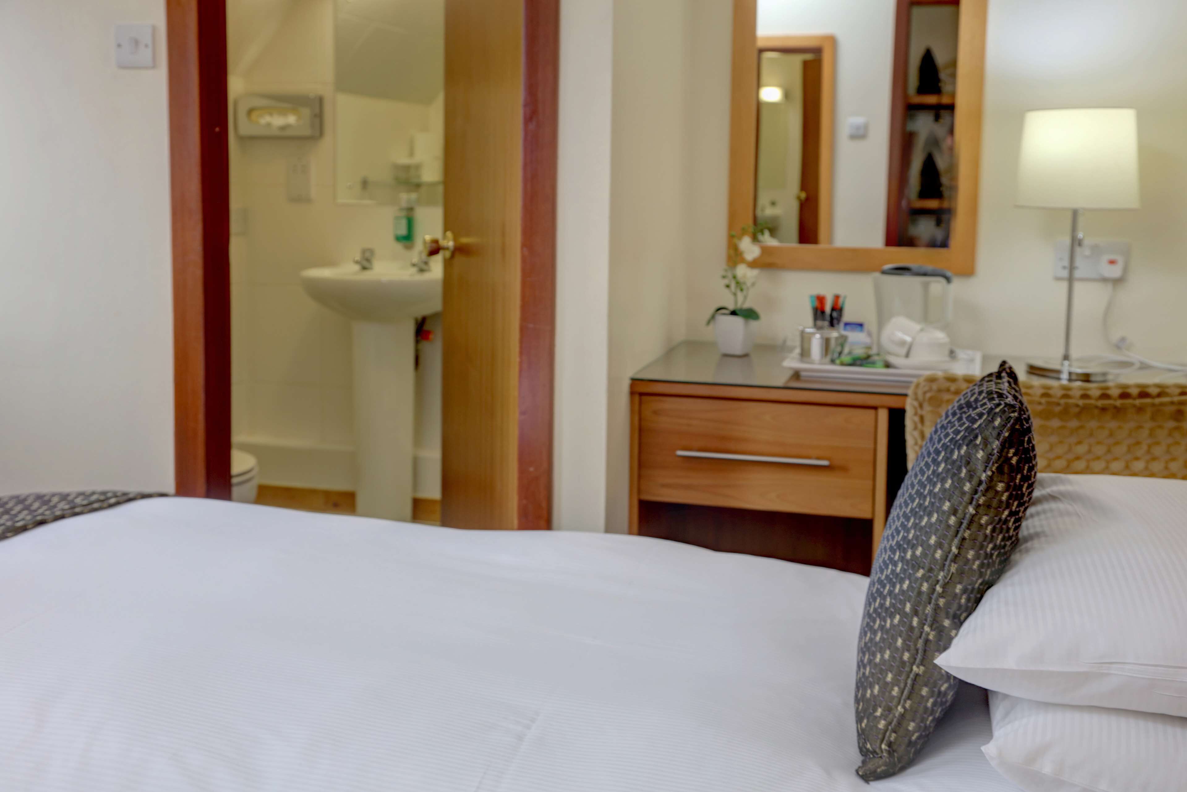 premium bedding, pillow-top beds, in-room safe, individually furnished