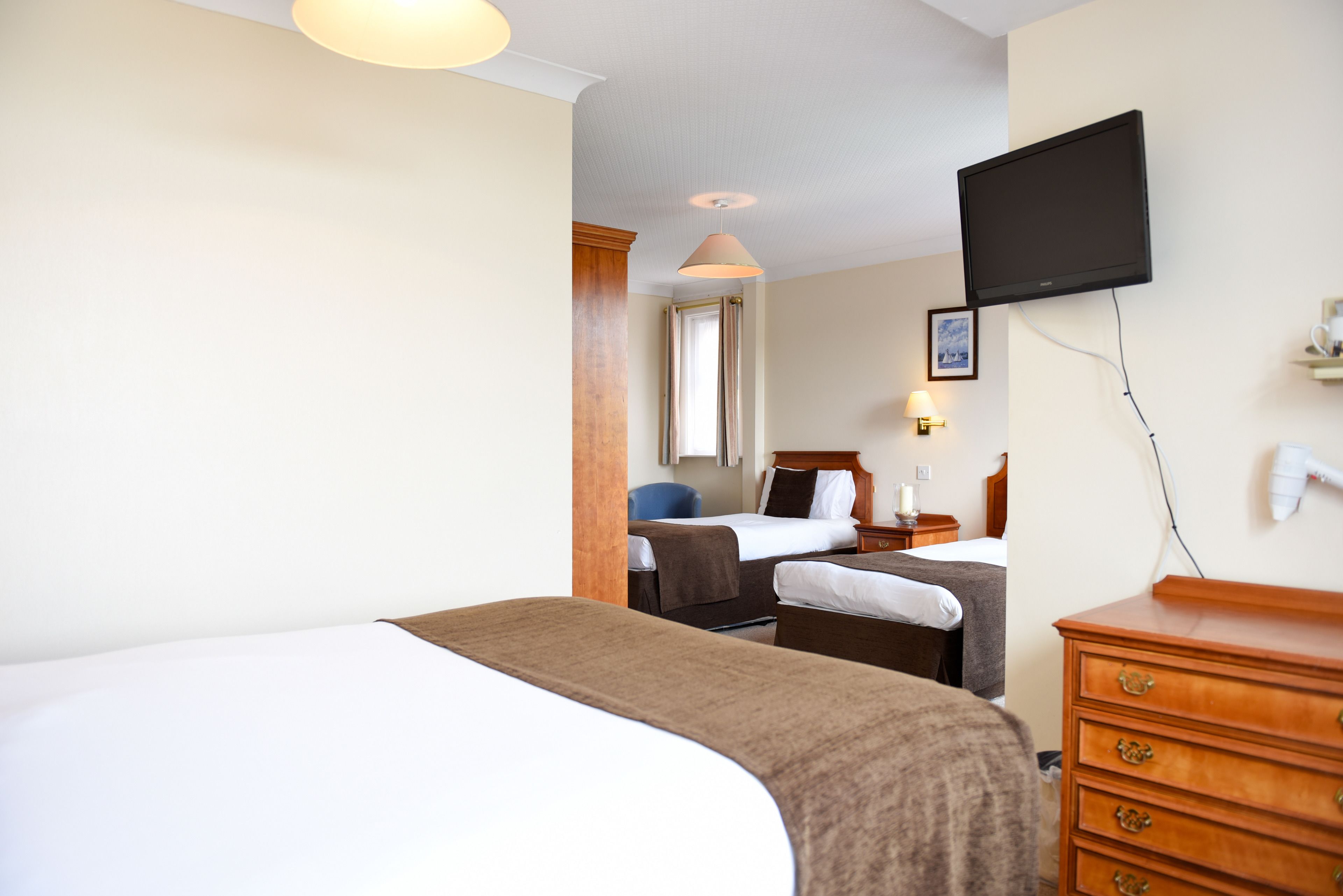 family room | hypo-allergenic bedding, desk, iron/ironing board, free wifi