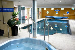 Indoor pool, open 7 AM to 9 PM, sun loungers