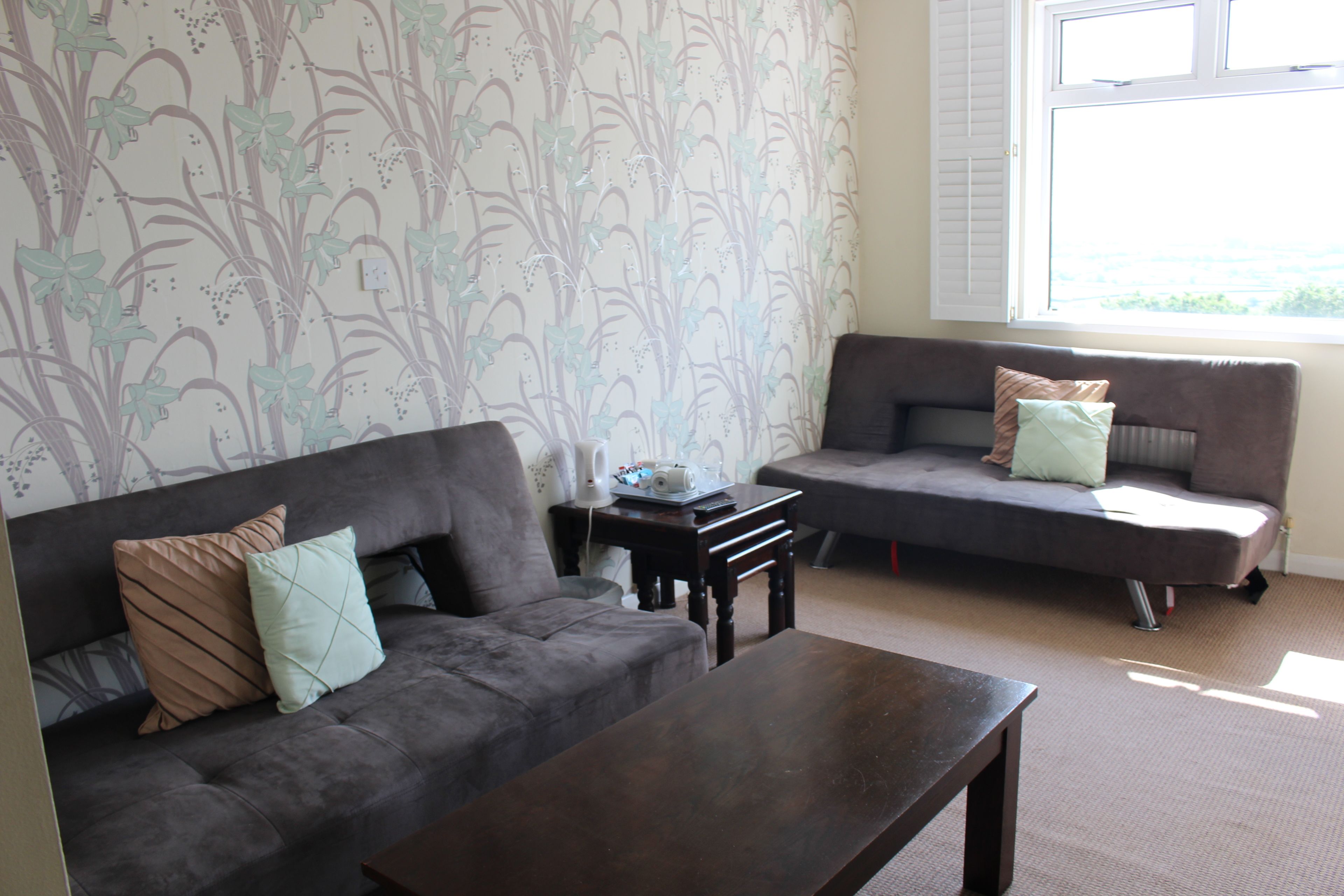 superior room, sea view | iron/ironing board, bed sheets