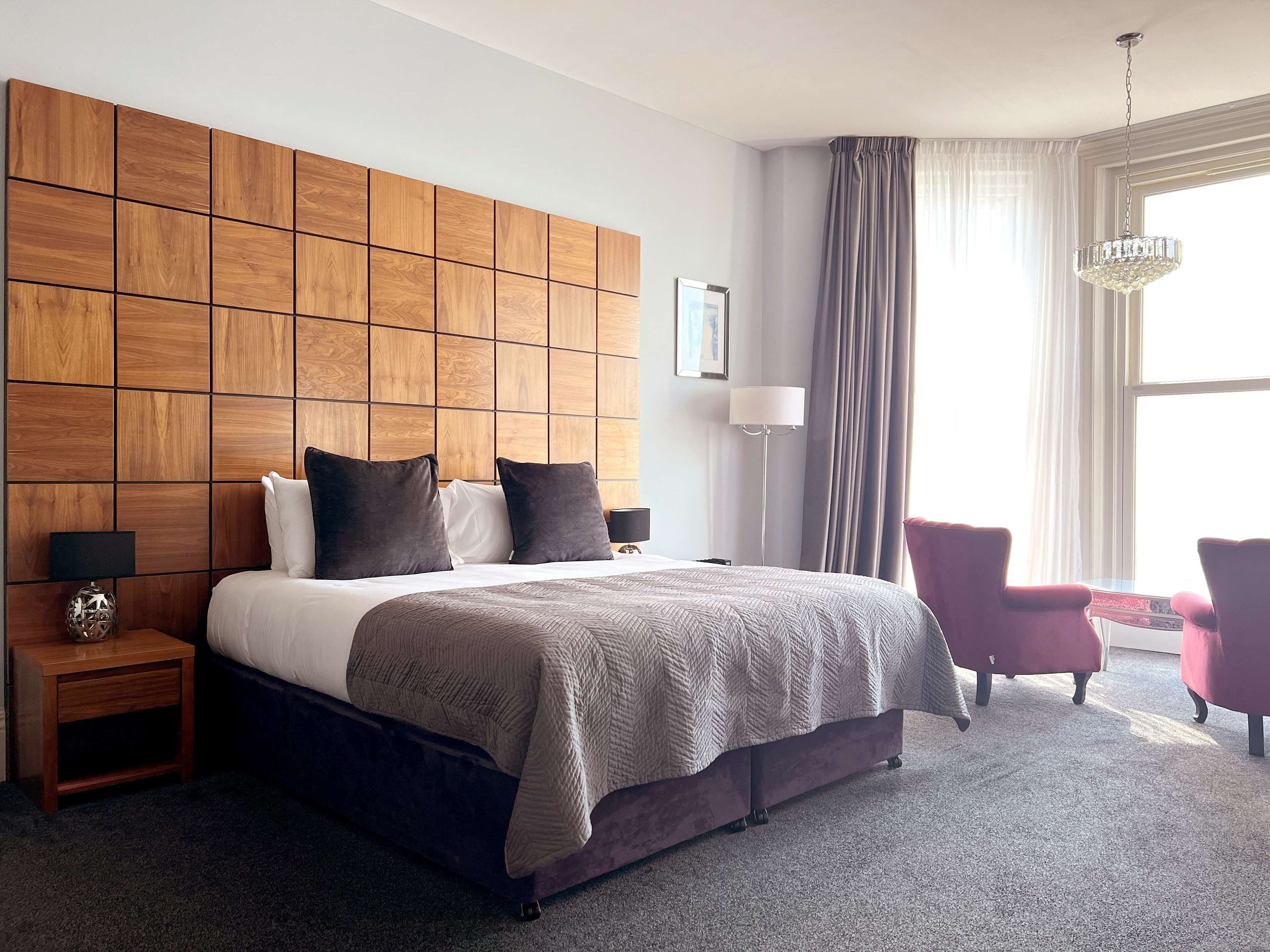 junior suite | premium bedding, in-room safe, desk, iron/ironing board