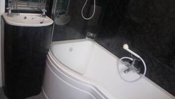 Family Suite, 2 Bedrooms | Deep-soaking bathtub