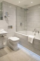 Deluxe Double Room | Bathroom | Combined shower/tub, designer toiletries, hair dryer, bathrobes