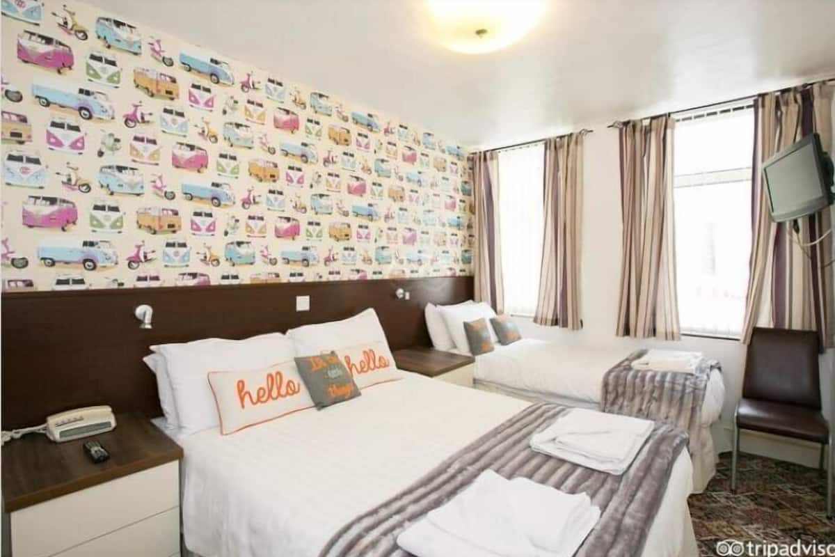 Standard Triple Room | Memory-foam beds, desk, iron/ironing board, free cots/infant beds