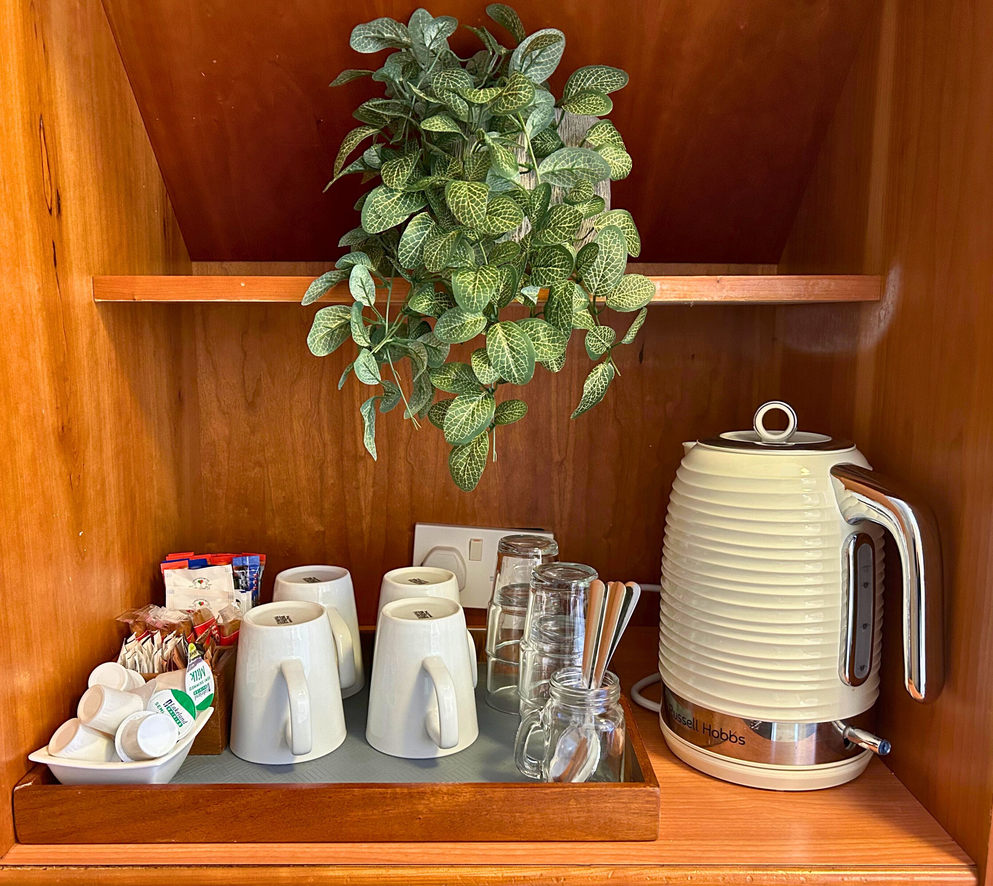 premium bedding, desk, laptop workspace, iron/ironing board