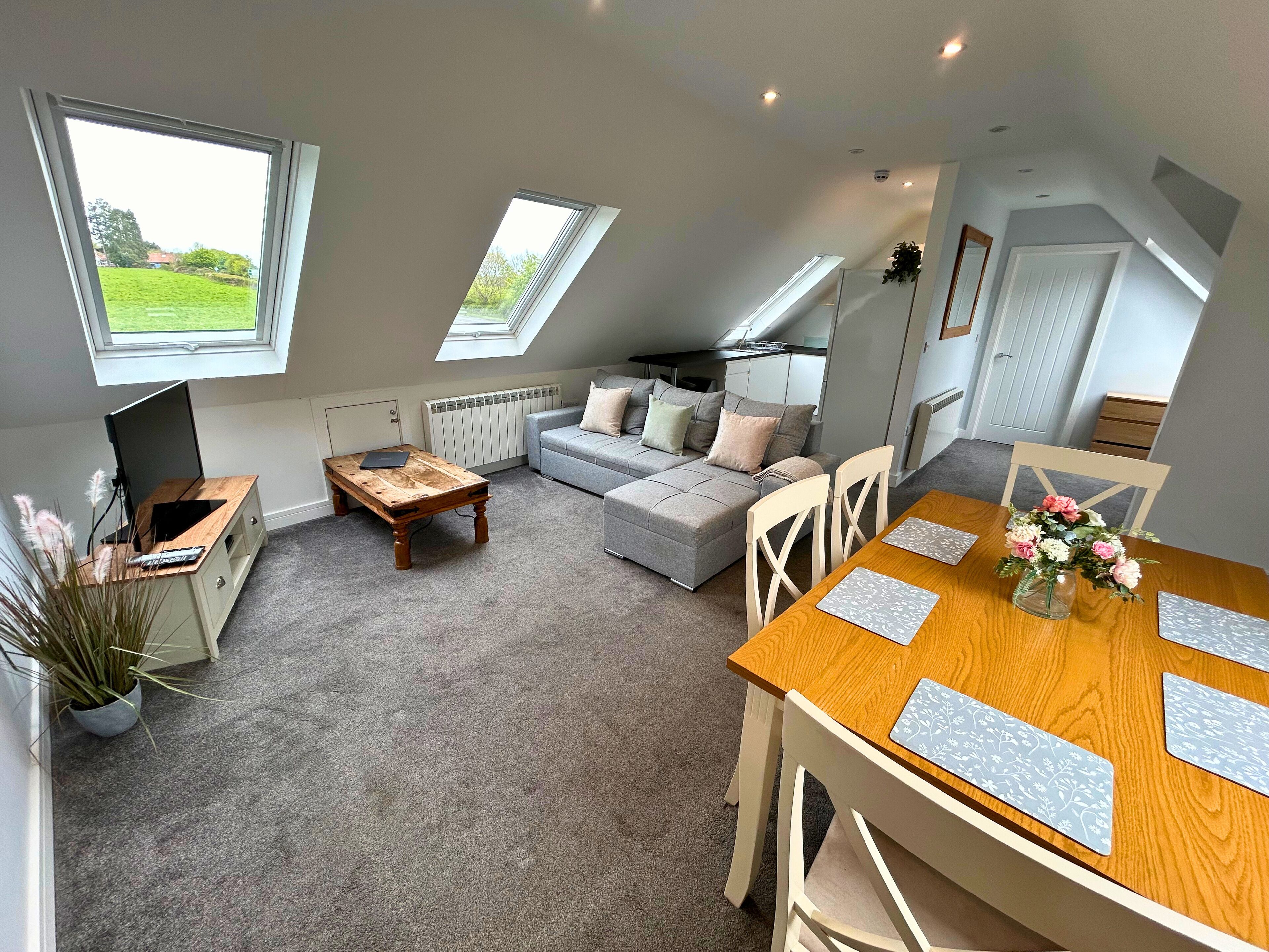 apartment | premium bedding, desk, laptop workspace, iron/ironing board