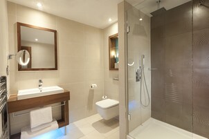 Shower, rainfall showerhead, designer toiletries, hair dryer
