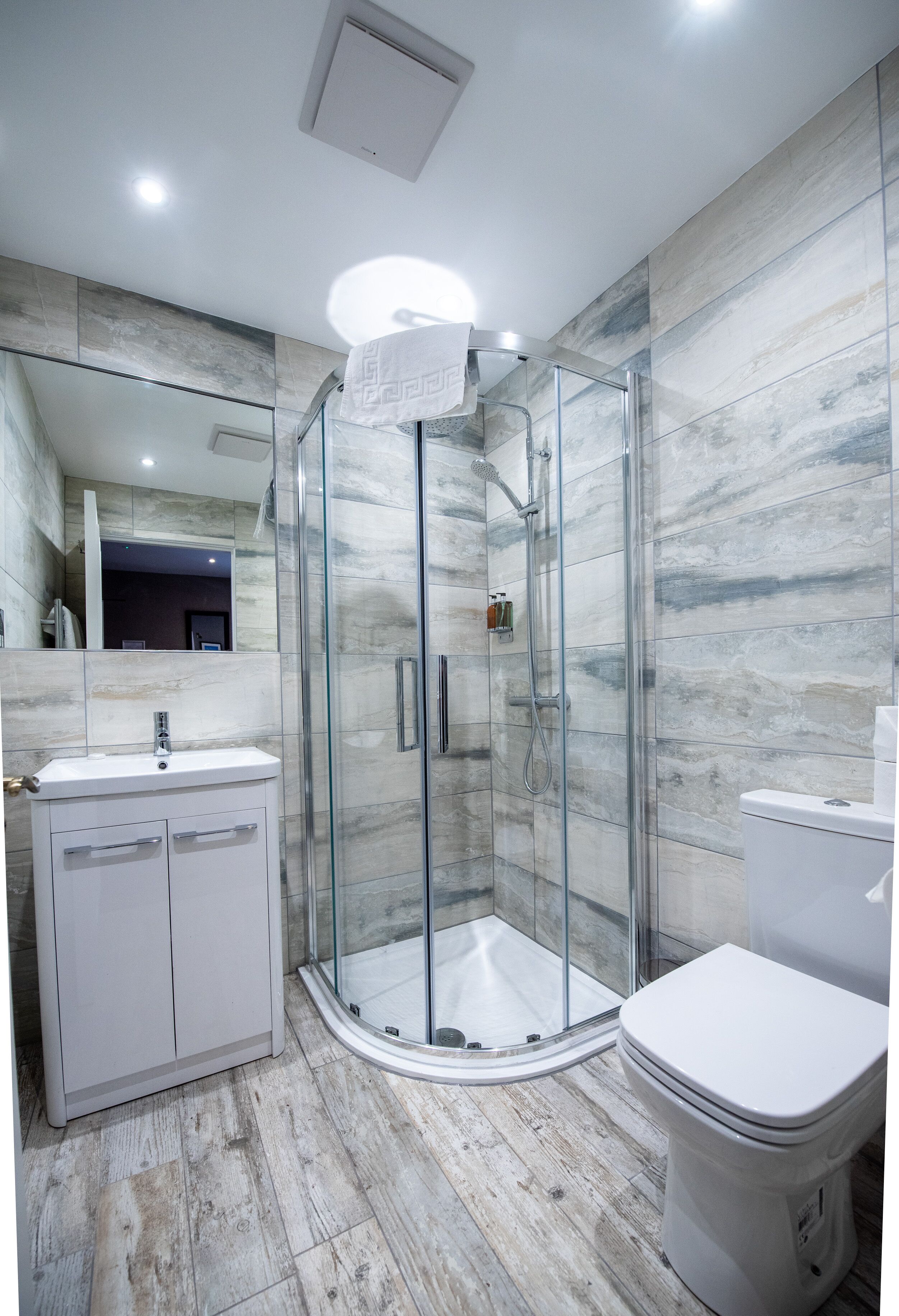 royal scots club at 34a, lower ground floor | bathroom | shower, designer toiletries, hair dryer, towels