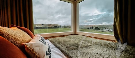 Premium bedding, down duvets, individually decorated