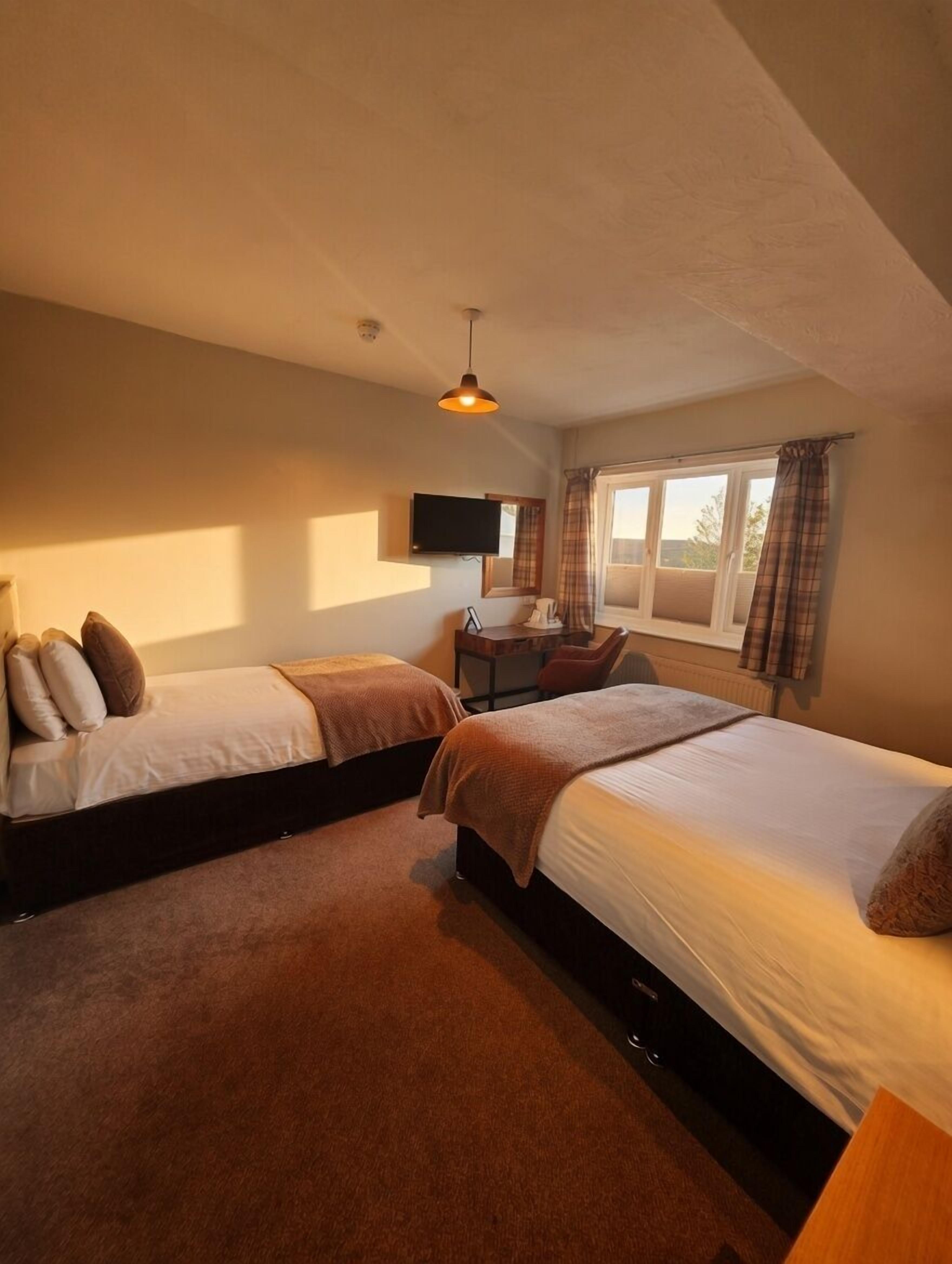 Triple Room En-suite (5) | Premium bedding, desk, laptop workspace, iron/ironing board