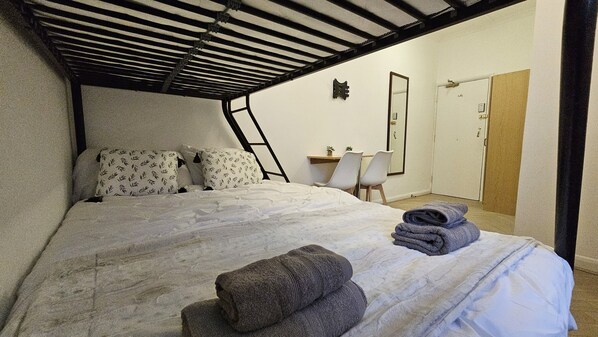 Desk, bed sheets