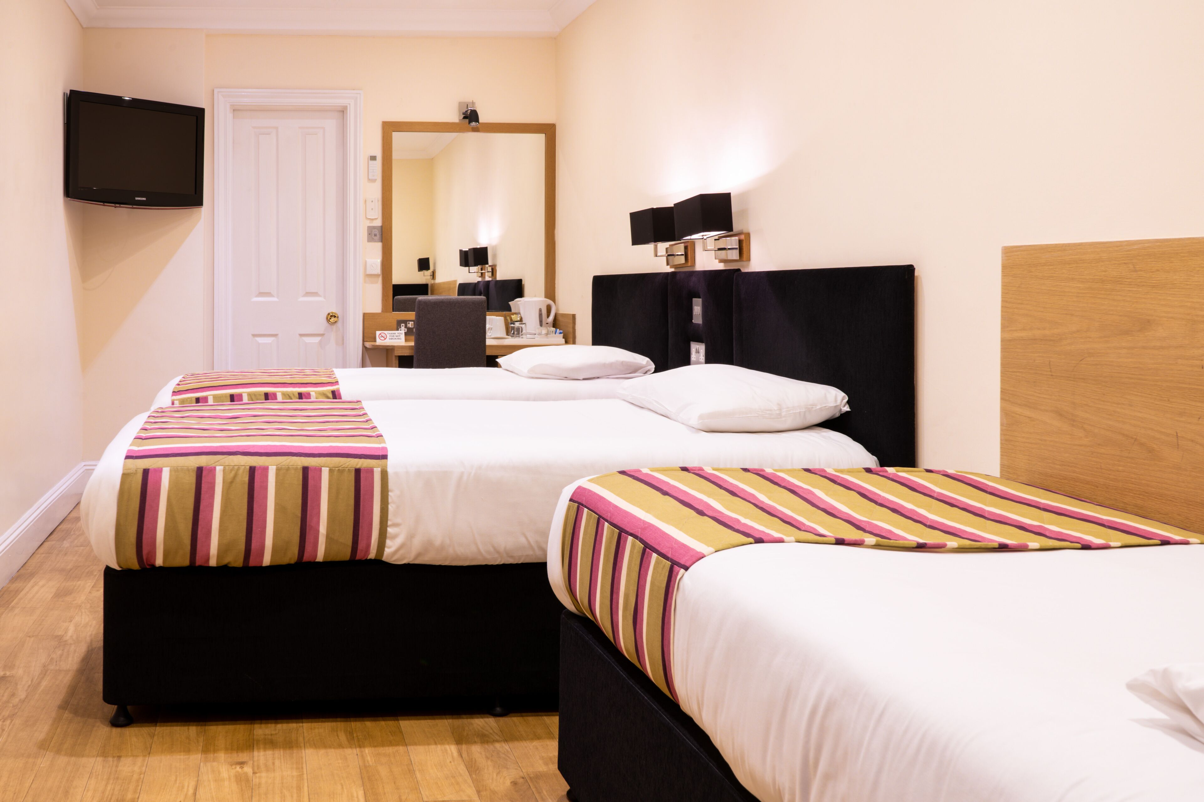 triple room | in-room safe, desk, blackout curtains, iron/ironing board