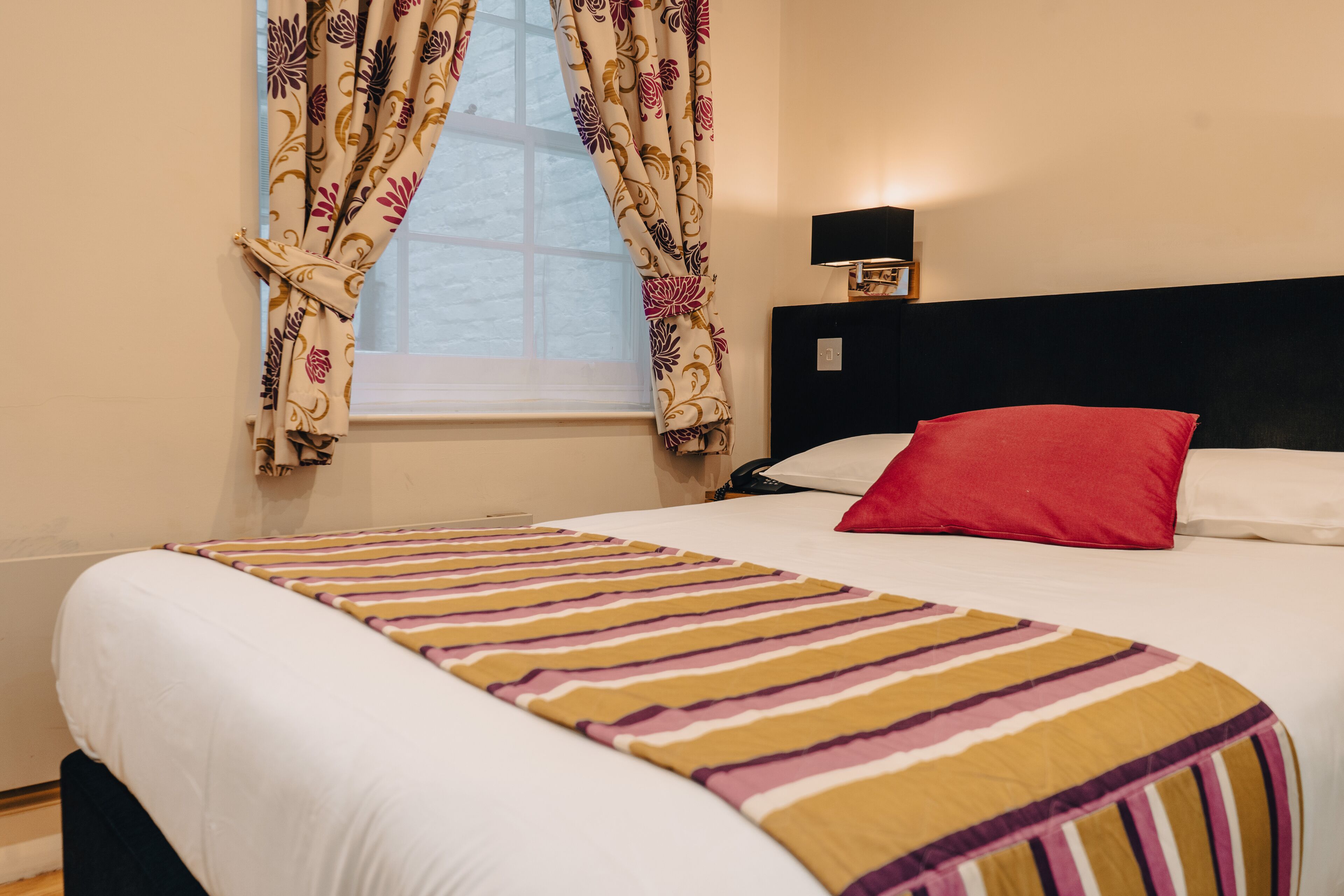 single room | in-room safe, desk, blackout curtains, iron/ironing board