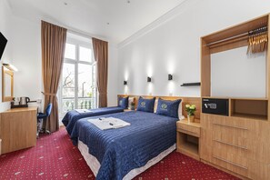 Chambre Triple Deluxe | Coffres-forts dans les chambres, chambres insonorisées