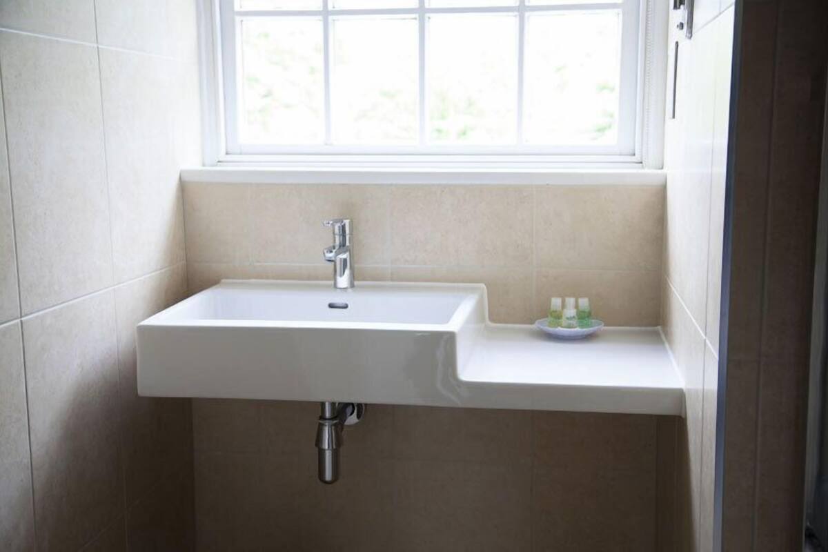 family room | 1 bedroom, premium bedding, in-room safe, blackout curtains