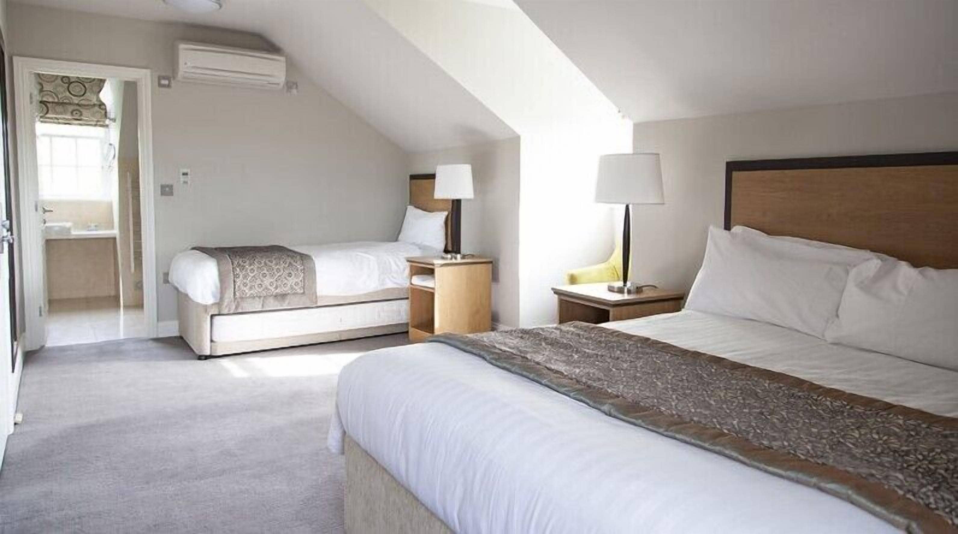 family room | 1 bedroom, premium bedding, in-room safe, blackout curtains