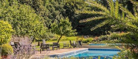 Seasonal outdoor pool, pool umbrellas