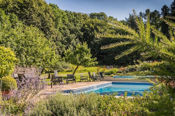 Seasonal outdoor pool, pool umbrellas