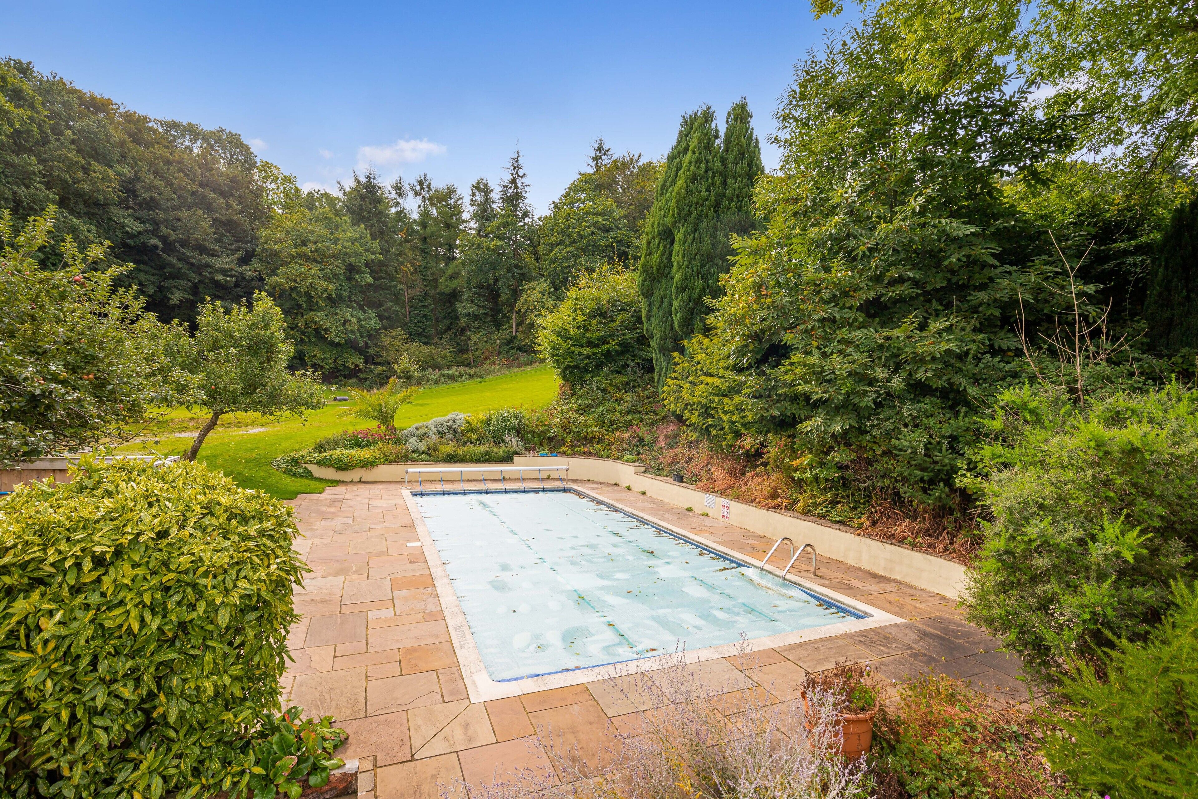 seasonal outdoor pool, pool umbrellas
