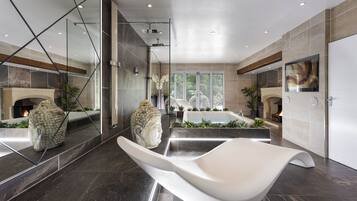 Grand Spa Suite | Bathroom | Designer toiletries, hair dryer, bathrobes, towels