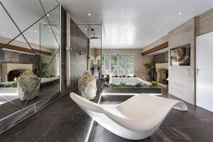 Grand Spa Suite | Bathroom | Designer toiletries, hair dryer, bathrobes, towels